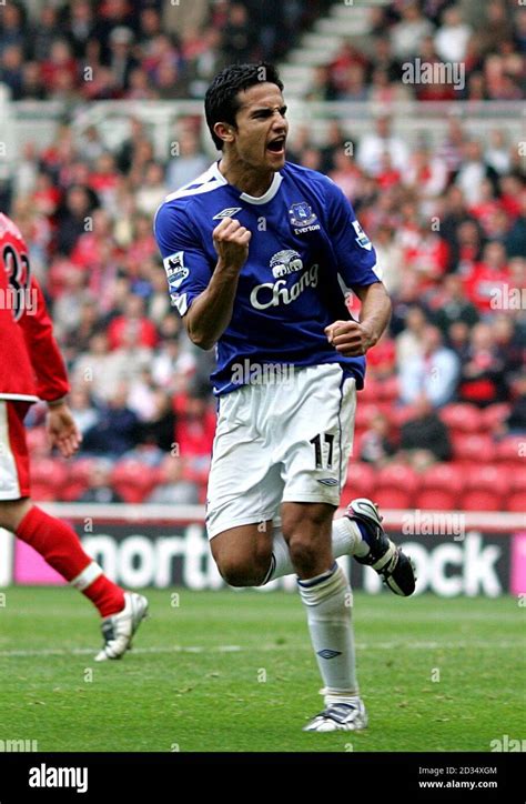 Everton's Tim Cahill celebrates scoring their first goal Stock Photo - Alamy