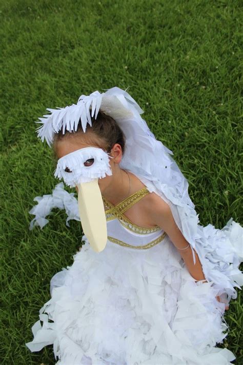 a remake of an old dress into a pelican costume, with wings and a ...