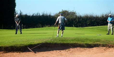 Putting out on the 6th green | Springwater Golf Club