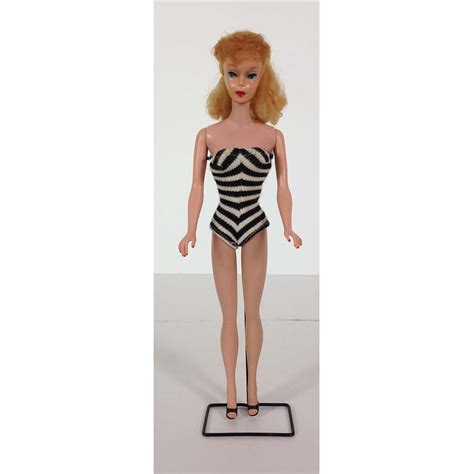 vintage barbie-sized picture of blond woman in plastic stand up frame ...