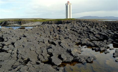 lighthouse in Kálfshamarsvík | Basalt columns, North iceland, Basalt