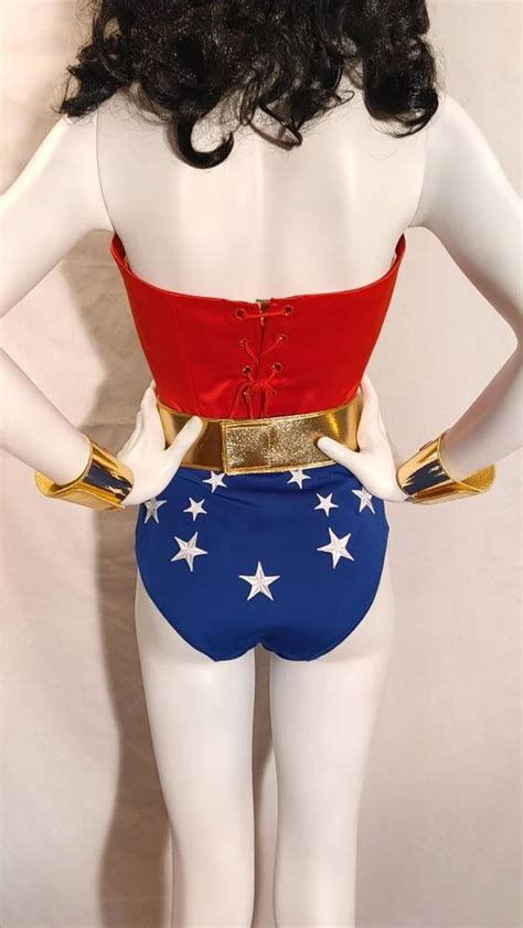 a mannequin wearing a red, white and blue bodysuit with stars on it