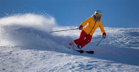 Person in Yellow Jacket and Red Riding on Snow Ski · Free Stock Photo