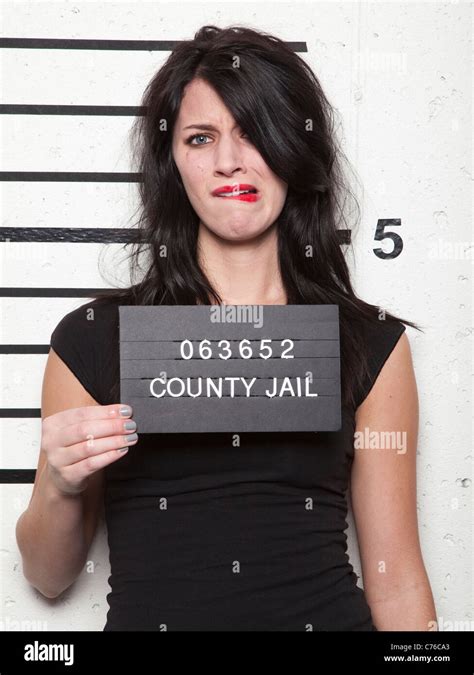 Studio mugshot of young woman Stock Photo - Alamy