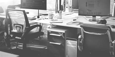 Man stretching arms during break time at office | Free stock photo - 1170