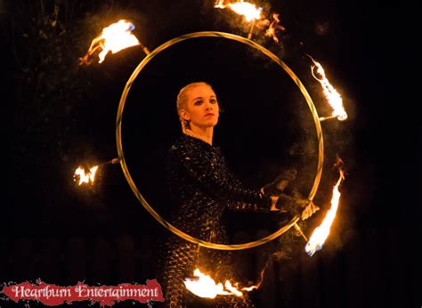 Hire fire hula hoop dancers | Book fire hula hoop dancers | Hire fire hoop show