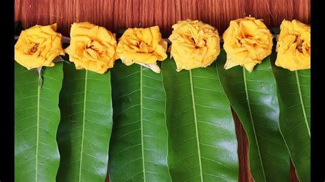 how to make mango leaf toran at home | mango leaves thoranam decoration ideas - YouTube