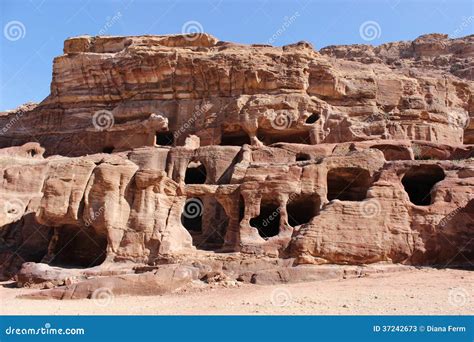 Caves in Petra, Jordan stock image. Image of dune, rocky - 37242673