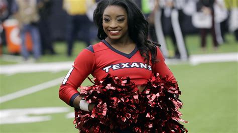 Simone Biles shines on the field as honorary Houston Texans cheerleader | abc13.com