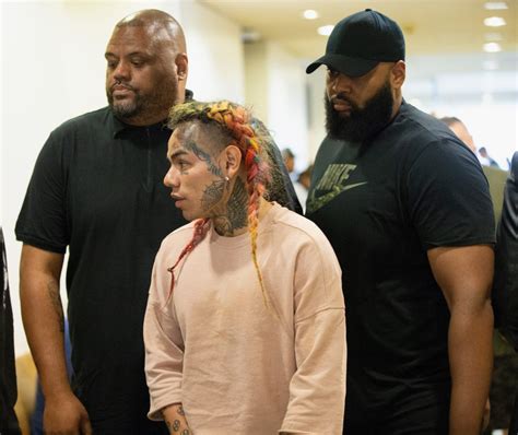 6ix9ine's Manager Charged With Assault for Altercation at Rapper's Post-Sentencing Celebration