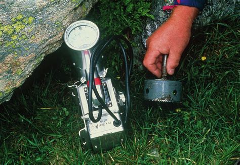 Using A Geiger Counter To Measure Radiation Levels Photograph by Pascal Goetgheluck/science ...