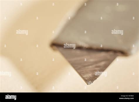 box cutter blade closeup Stock Photo - Alamy