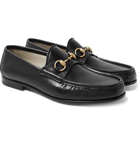 Gucci 's iconic loafers were first introduced in 1953; it says a ...