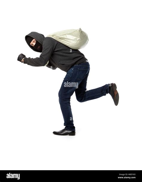 Thief run away bag Cut Out Stock Images & Pictures - Alamy