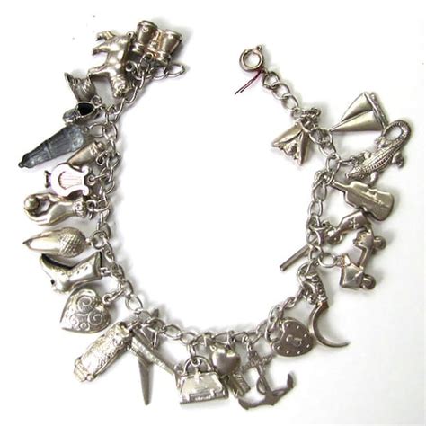 Vintage Sterling Silver Charm Bracelet. Fully Loaded 23 Charms