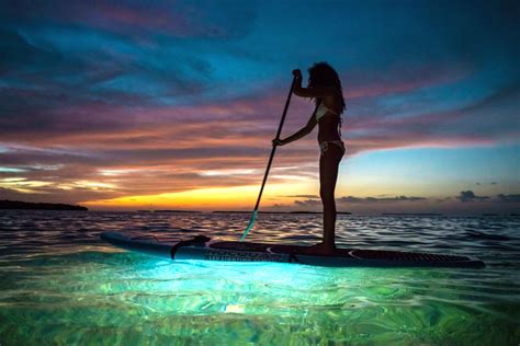 Stand-up paddleboarding under the stars