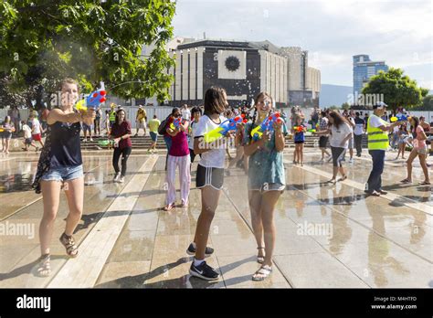 Water gun fight summer Stock Photo - Alamy