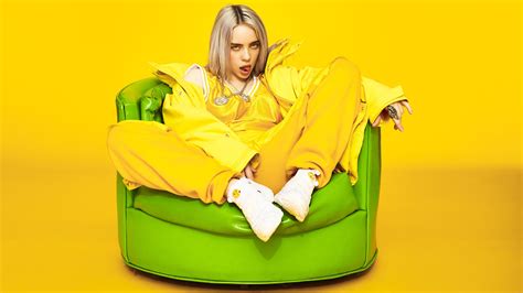 Billie Eilish Is Wearing Yellow Dress Sitting On Green Couch In Yellow ...