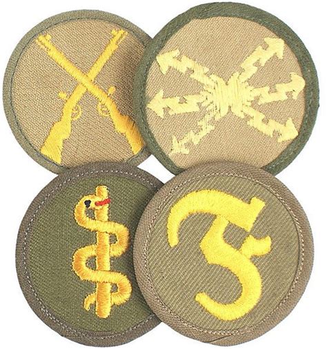 574: Lot of 4 German WWII Afrika Korps insignia : Lot 574