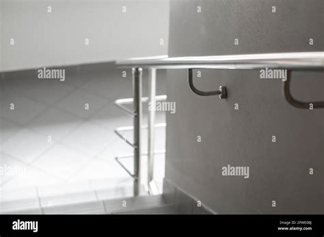 modern chrome handrails on the stairs Stock Photo - Alamy