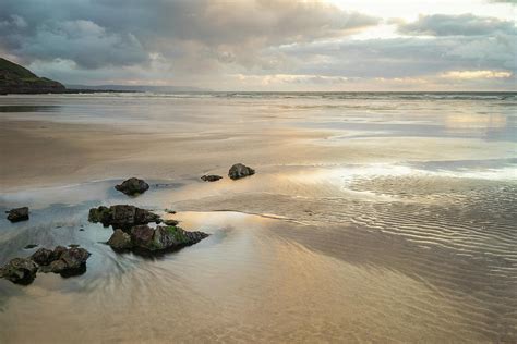 beach scene at Westward Ho Photograph by Tony Twyman