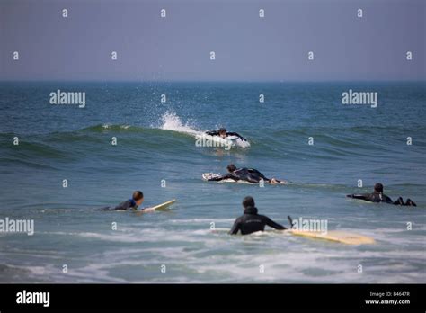 Surfing waves of Far Rockaway Beach on a very hot day of June Far ...