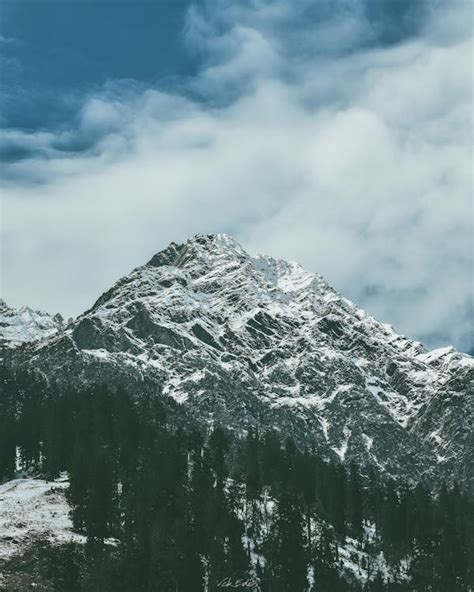 Snow Covered Rocky Mountain · Free Stock Photo