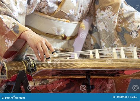 Koto japanese harp stock image. Image of play, finger - 141536983