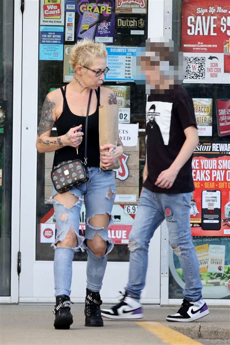 Eminem's ex Kim grabs pizza with rarely-seen teenage son Parker in new ...