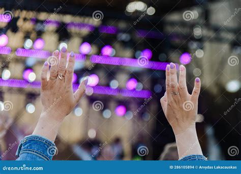 A Festival Crowd Raising Their Hands.Party People at a Concert Stock Photo - Image of ...