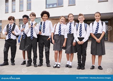 Portrait Of High School Student Group Wearing Uniform Standing Outside School Buildings Stock ...