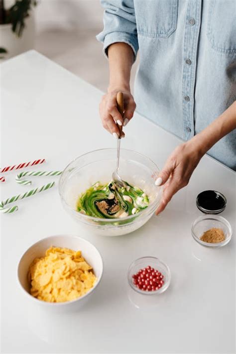 Person Mixing Baking Ingredients in a Bowl · Free Stock Photo