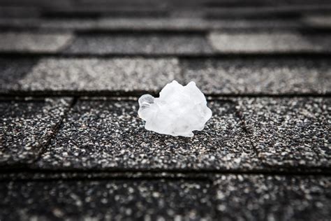 How to Spot and Deal With Hail Damage to Roof Shingles