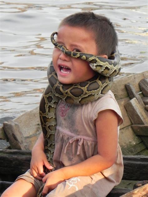 I see your two girls in cooking bowls holding snakes and wooden spoons ...