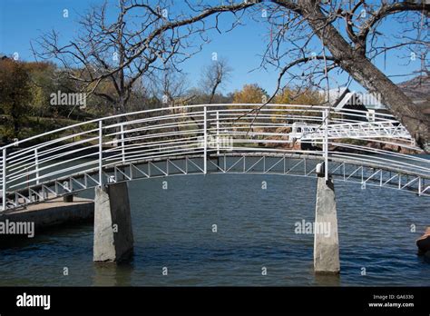 BRidge over a creek Stock Photo - Alamy