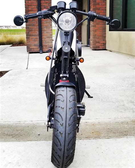 a motorcycle parked in front of a building