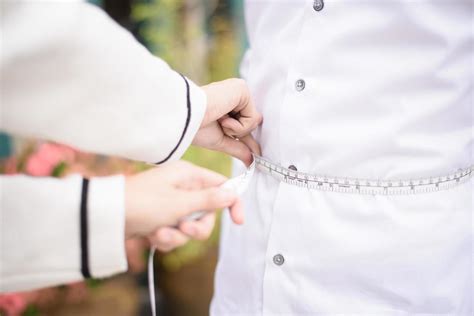 Tailor measuring the size for a tailor 11550808 Stock Photo at Vecteezy