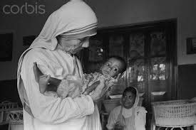 Pictures of Mother Teresa helping the poor