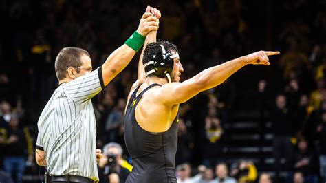 Flipboard: Wrestling photos: No. 1 Iowa beats No. 2 Penn State at sold ...