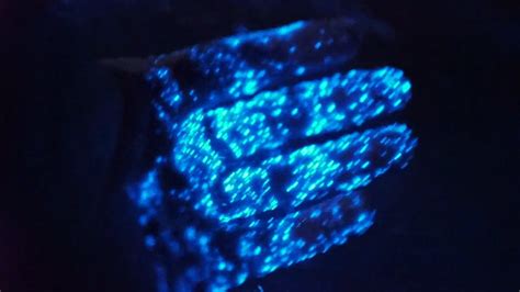 a blue object is glowing in the dark