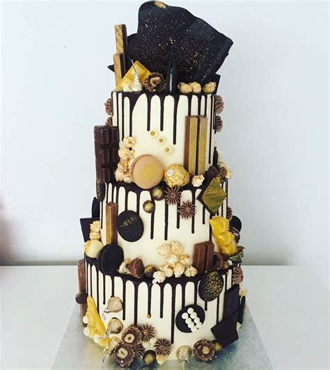 Loaded chocolate drizzle cake with custom gold splattered chocolate sail | Drizzle cake ...