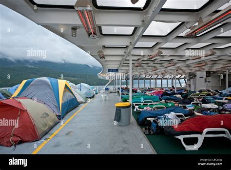 Passenger sleeping in the solarium. Columbia ferry. Alaska Inside Stock Photo, Royalty Free ...