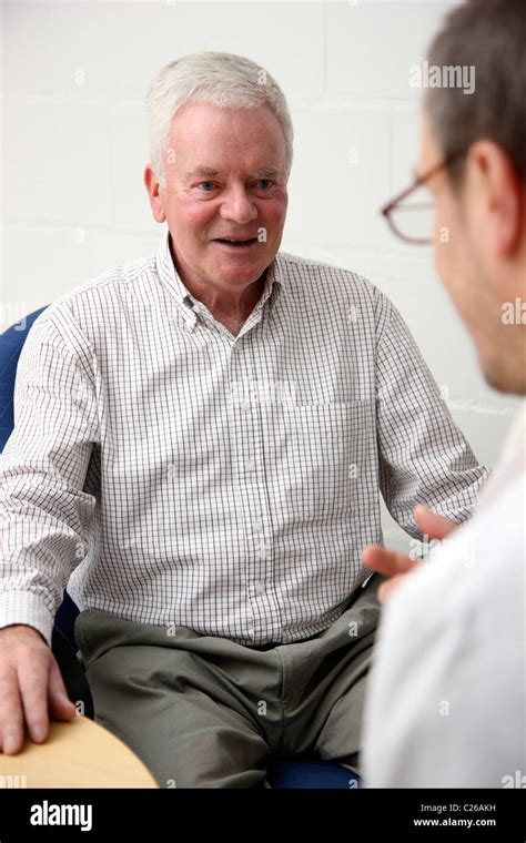 Senior, man, 71 years old, male, in a consultation with his medical doctor Stock Photo - Alamy