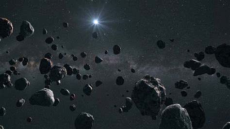 Mysterious objects 'found lurking beyond Pluto' suggest there is 'new ...