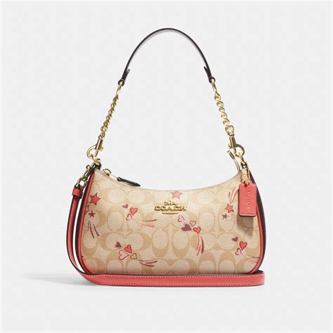 Coach Teri Shoulder Bag In Signature Canvas With Heart And Star Print ...