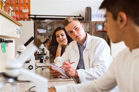 High School Student with Microscopes in Laboratory. Stock Image - Image of beautiful, secondary ...