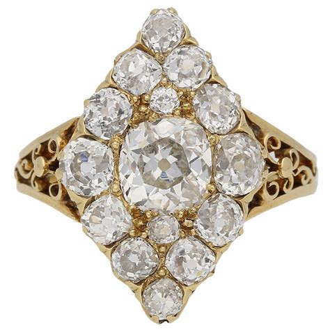 Antique Marquise Shaped Diamond Gold Cluster Ring For Sale at 1stDibs