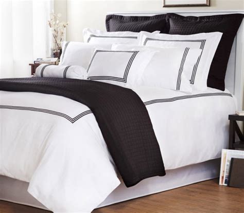 White comforter with black trim – ChoozOne