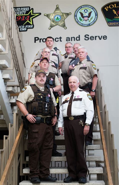 Grand Forks County Sheriff's Department wearing pink badges for breast cancer awareness - Grand ...