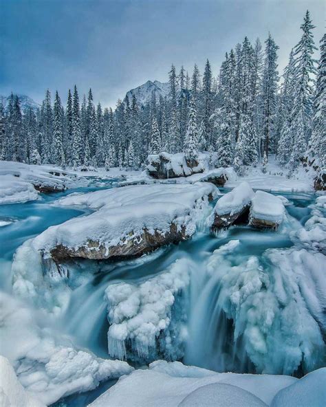 ***The big freeze: Icy cold glacial waters of the Kicking Horse River at the Natural Bridge ...